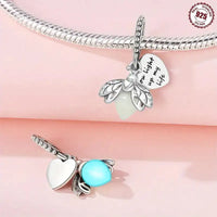 Luminous Firefly Charm